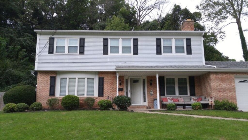 70s colonial renovation on hill